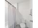 Clean bathroom featuring a shower and toilet at 11205 Se 69Th Ter, Belleview, FL 34420