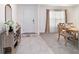 Welcoming foyer area featuring decor, tile floors, and a dining table at 11205 Se 69Th Ter, Belleview, FL 34420