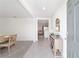 Inviting foyer with dining area, tile floors, and neutral decor at 11205 Se 69Th Ter, Belleview, FL 34420