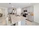 Stylish kitchen featuring granite countertops, stainless steel appliances, and an island at 11205 Se 69Th Ter, Belleview, FL 34420