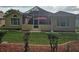 Enclosed backyard patio and a well maintained lawn at 11298 Sw 73Rd Cir, Ocala, FL 34476
