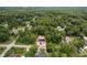 Aerial view of a newly constructed home in a heavily wooded and quiet setting at 11506 Nw 20Th St, Ocala, FL 34482