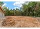 Cleared backyard featuring mature trees, the perfect canvas for creating your dream outdoor oasis at 11506 Nw 20Th St, Ocala, FL 34482
