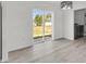 Bright dining room with a sliding glass door that opens to the backyard and a laundry room at 11506 Nw 20Th St, Ocala, FL 34482