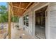 Exterior view of a home under construction, with block walls and framing visible under the porch at 11506 Nw 20Th St, Ocala, FL 34482