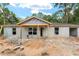 Exterior of home under construction showing concrete block structure and a partially completed roof at 11506 Nw 20Th St, Ocala, FL 34482