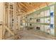 Under-construction space with modern wood framing, insulation, and electrical wiring ready for customization at 11506 Nw 20Th St, Ocala, FL 34482