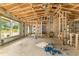 View of the interior of a home under construction, showcasing the framing and window placement at 11506 Nw 20Th St, Ocala, FL 34482