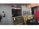 Inside a well-maintained barn with stalls and storage, perfect for equestrian enthusiasts at 12524 Sw 109Th Pl, Dunnellon, FL 34432
