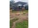 Outdoor barn with hay and equipment provides ample storage and shelter for farm animals and machinery at 12524 Sw 109Th Pl, Dunnellon, FL 34432