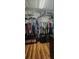 A walk-in closet with wire shelving and an organized array of clothing, shoes, and storage baskets at 12524 Sw 109Th Pl, Dunnellon, FL 34432