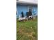 Home exterior showcasing pool equipment and a well-maintained lawn at 12524 Sw 109Th Pl, Dunnellon, FL 34432
