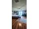 Large primary bedroom featuring wood flooring, with plenty of space and natural light at 12524 Sw 109Th Pl, Dunnellon, FL 34432