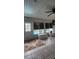 Sunroom featuring tile flooring and sliding glass doors with pool views at 12524 Sw 109Th Pl, Dunnellon, FL 34432
