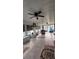 Bright sunroom with tile floor, ceiling fans, and views of the pool and backyard at 12524 Sw 109Th Pl, Dunnellon, FL 34432