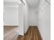 View of closet with custom wire shelving and laminate floors at 13803 Se 44Th Ave, Summerfield, FL 34491