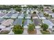 Scenic aerial view of the neighborhood showcasing the homes, trees, and community at 1405 Espinoza Ln, Lady Lake, FL 32159