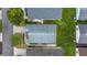 Overhead community view highlighting well-maintained landscaping, mature trees, and cozy home designs at 1405 Espinoza Ln, Lady Lake, FL 32159