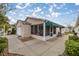 Single Gathering home has a screened in porch and a two car garage at 1405 Espinoza Ln, Lady Lake, FL 32159