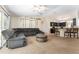 Bright living room flows into kitchen with breakfast bar seating at 14650 Sw 33Rd Ln, Ocala, FL 34481
