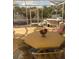 Enclosed patio with wicker furniture and seating area; perfect for relaxing at 1815 Puerto Bello Dr, The Villages, FL 32159