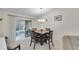 Cozy dining area with sliding doors leading to outdoor patio, great for entertaining at 1819 Captiva Ct, The Villages, FL 32162