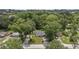 Aerial view showcasing the home's well-maintained yard, mature trees, and the neighborhood's tranquil residential setting at 1831 Sw 5Th Ave, Ocala, FL 34471