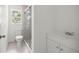 Modern bathroom with a glass door shower and a white vanity at 1831 Sw 5Th Ave, Ocala, FL 34471