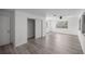 Large living room with new laminate flooring and access to the screened-in porch at 1831 Sw 5Th Ave, Ocala, FL 34471