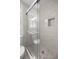Beautiful remodeled bathroom with modern tile and a glass door shower at 1831 Sw 5Th Ave, Ocala, FL 34471