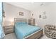 Cozy bedroom featuring a ceiling fan, and two night stands at 19115 Sw 98Th Loop, Dunnellon, FL 34432