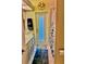 Bathroom featuring a shower with floral curtain and an exit door, plus a vanity with ample storage at 19480 Sw 100Th Loop, Dunnellon, FL 34432