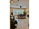 Bright and airy dining room with a large window at 19480 Sw 100Th Loop, Dunnellon, FL 34432