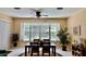 Comfortable dining area with views of the pool at 19480 Sw 100Th Loop, Dunnellon, FL 34432