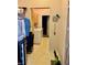 Functional laundry room with washer, dryer, storage, and ample space at 19480 Sw 100Th Loop, Dunnellon, FL 34432