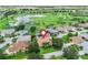 Beautiful home featuring views of a golf course and a serene lake community at 2721 Day Lily Run, The Villages, FL 32162