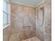 Close up of the shower with seat at 2721 Day Lily Run, The Villages, FL 32162