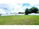 Spacious grassy backyard is completely enclosed with a white privacy fence at 2883 Sw 146Th Place Rd, Ocala, FL 34473