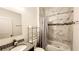 Bright bathroom featuring granite sink, bathtub and shower with marble style tile at 2883 Sw 146Th Place Rd, Ocala, FL 34473