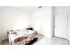 Bedroom with closet and blanket on bed at 2883 Sw 146Th Place Rd, Ocala, FL 34473