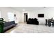 Spacious living room with large-format tile flooring and neutral paint at 2883 Sw 146Th Place Rd, Ocala, FL 34473
