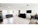 Bright open space with tile flooring, a comfortable seating arrangement, and ample natural light at 2883 Sw 146Th Place Rd, Ocala, FL 34473