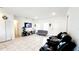 Inviting living room showcasing a cozy seating arrangement and well-lit space at 2883 Sw 146Th Place Rd, Ocala, FL 34473