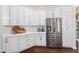 Kitchen with stainless steel appliances, quartz countertops, and ample cabinet space at 3001 Hillside Ln, The Villages, FL 32162