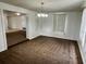 Sunlit dining area with neutral decor and large windows, connecting seamlessly to adjacent living spaces at 3801 Sw 147Th Lane Rd, Ocala, FL 34473