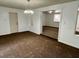 Traditional dining area with a chandelier and an open view to the living room and kitchen at 3801 Sw 147Th Lane Rd, Ocala, FL 34473