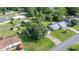 Overhead shot displaying the property, surrounding neighborhood, and nearby pool at 42 Almond Dr, Ocala, FL 34472