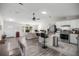 Well-lit open floor plan featuring stainless appliances and breakfast bar seating at 42 Almond Dr, Ocala, FL 34472