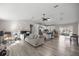 Spacious living area seamlessly integrates a modern kitchen and dining space at 42 Almond Dr, Ocala, FL 34472