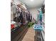 Organized walk-in closet features built-in drawers and ample storage for clothes and other personal belongings at 42 Almond Dr, Ocala, FL 34472